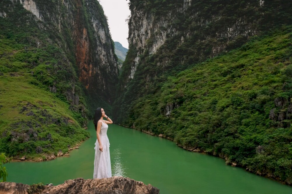 Frame the breathtaking beauty of Tu San Canyon, where nature's masterpiece unfolds
